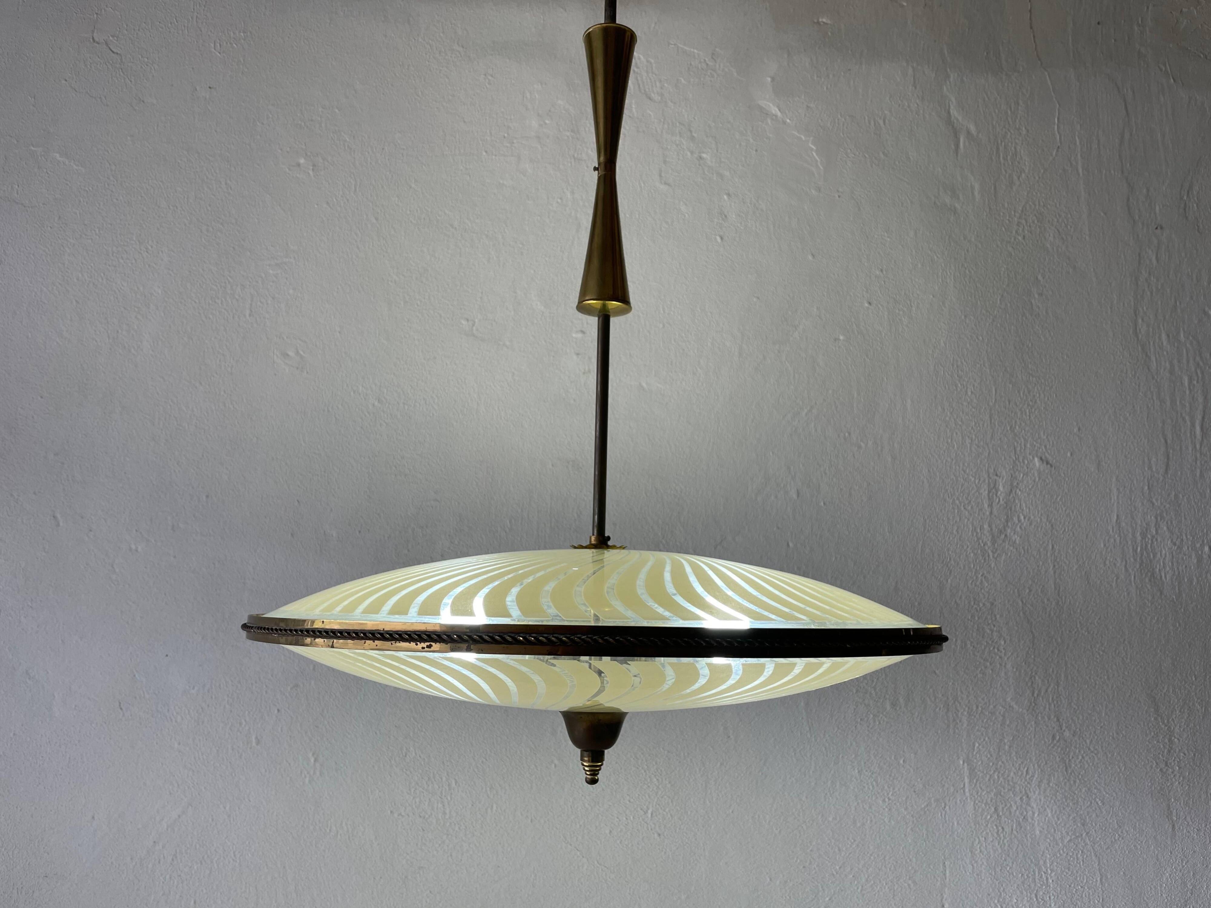 Large UFO design ceiling light in brass and printed glass, 1950s, Italy.