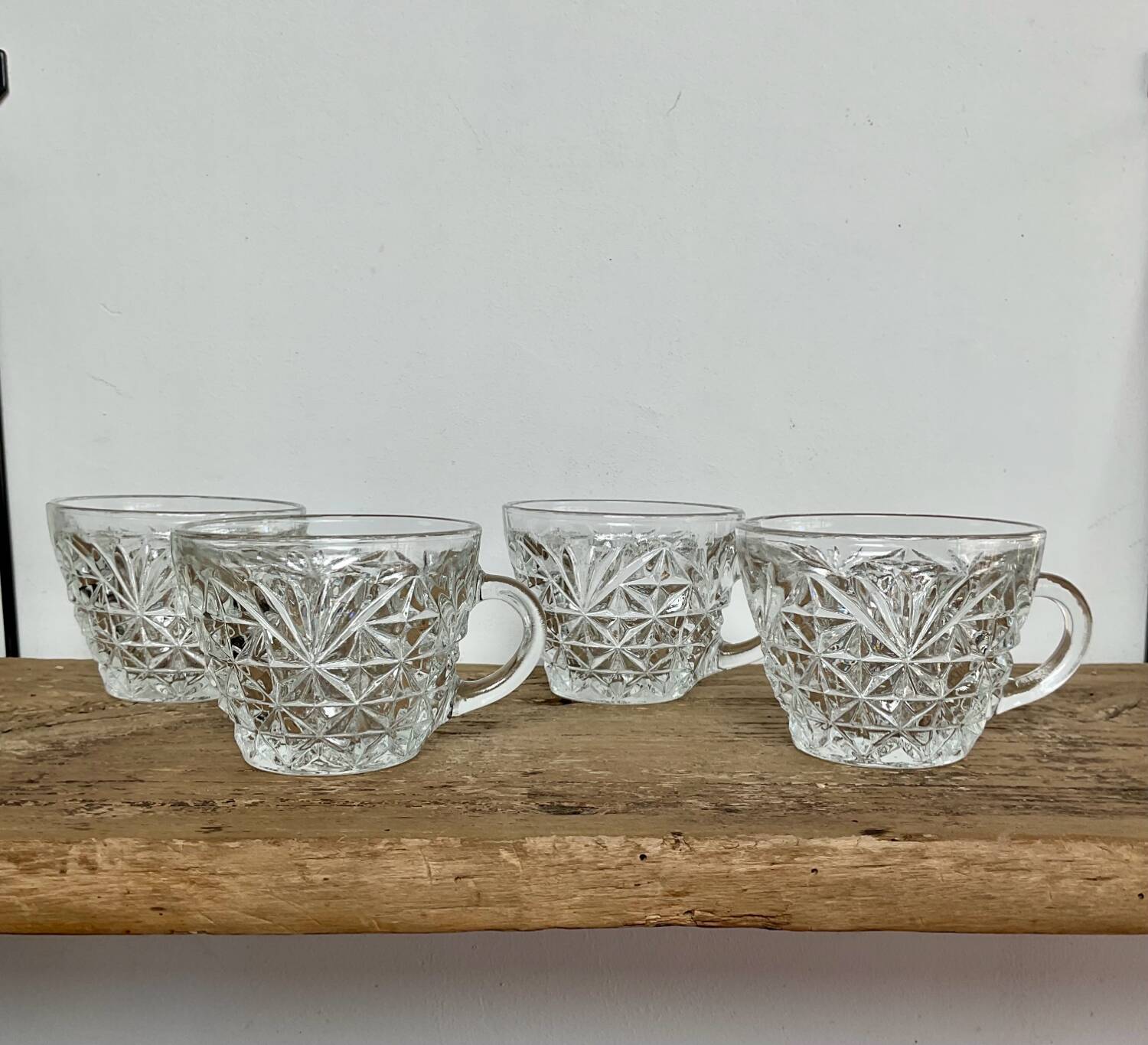 Set of 4 cut glass cups