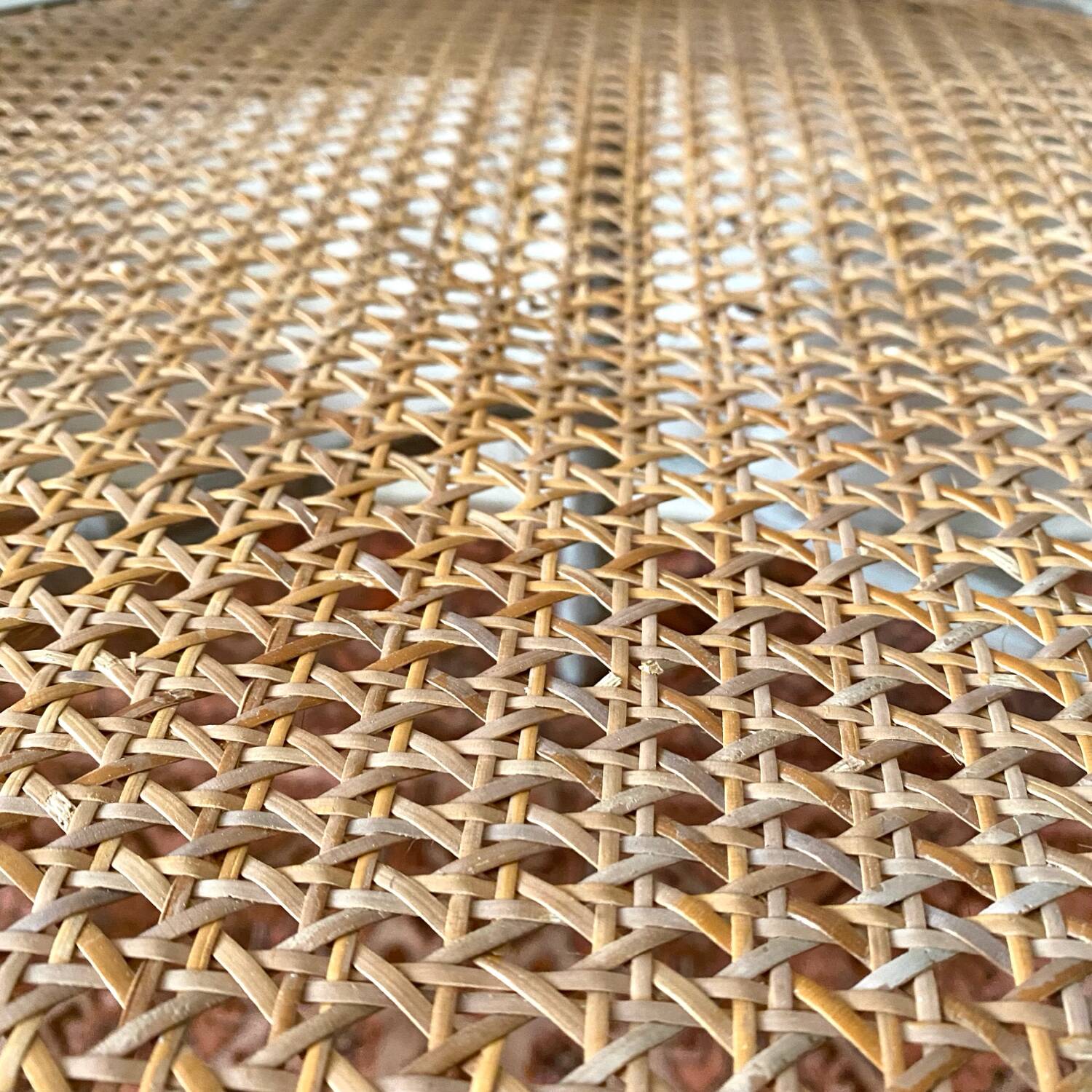 19th-century corner fireplace armchair, wood and cane.