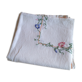 Antique linen tablecloth embroidered with flowers