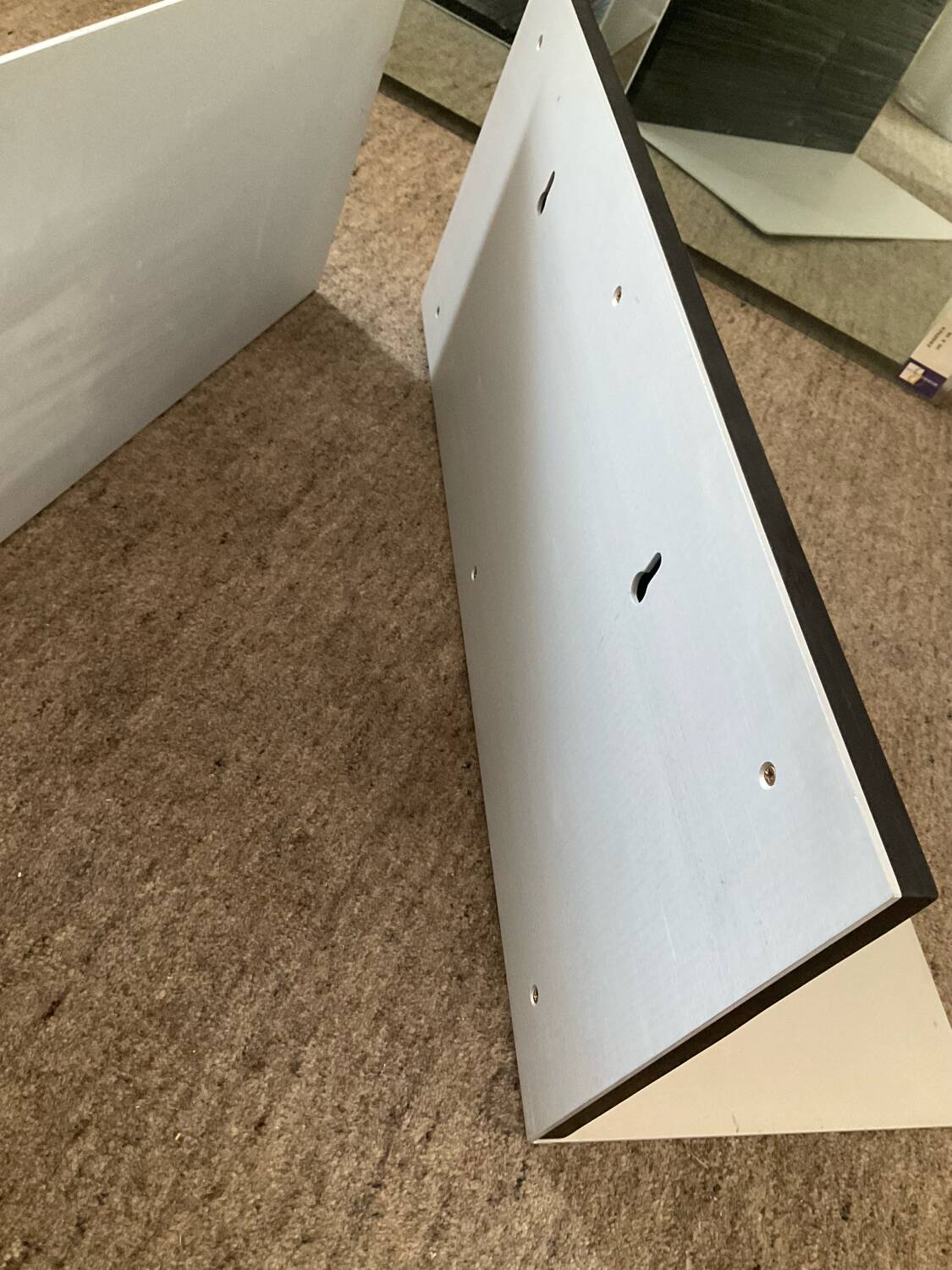 Pair of contemporary shelves in steel and stained wood