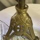 Pair of candlesticks in bronze and brass