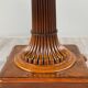 Oval Empire-style table with a central pedestal, 19th century.