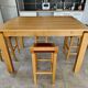 Table haute en bois massif extensible + 4 tabourets