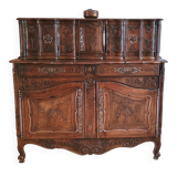 Provençal buffet with two bodies in solid walnut from the 18th century.