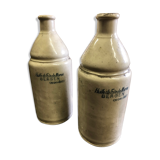 Bouteilles en grès huile de foie de morue