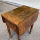 Victorian Pembroke table from the 19th century in walnut burr with drop-leaves.