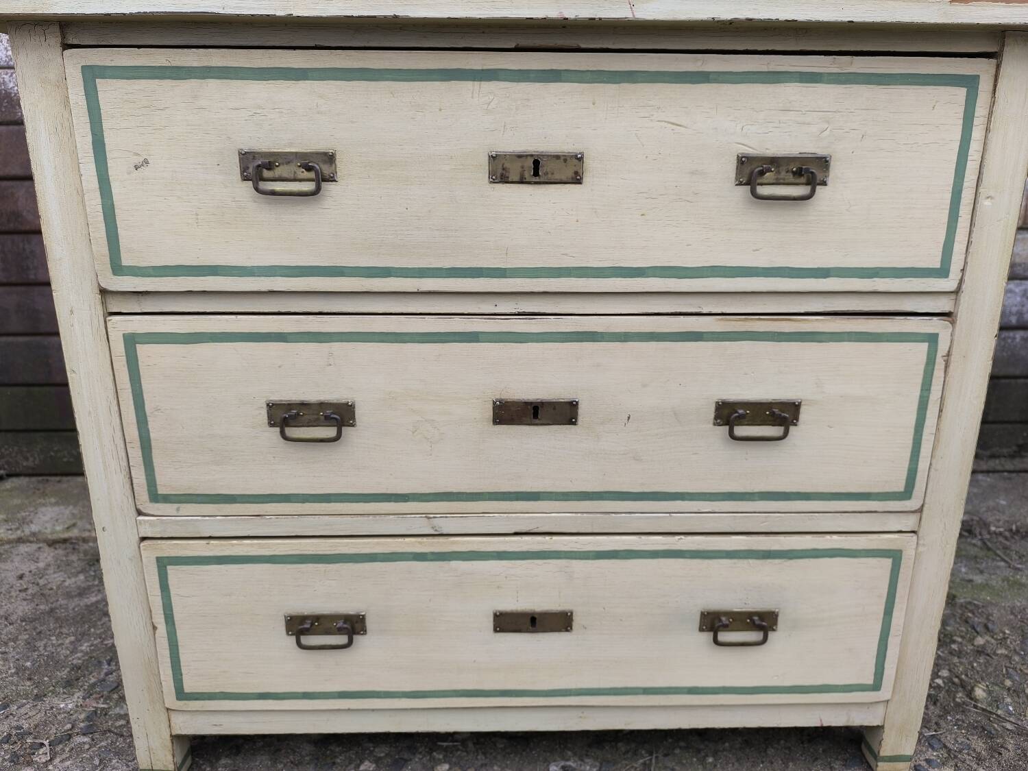 4-drawer chest of drawers with yellow and green patina by a local artist