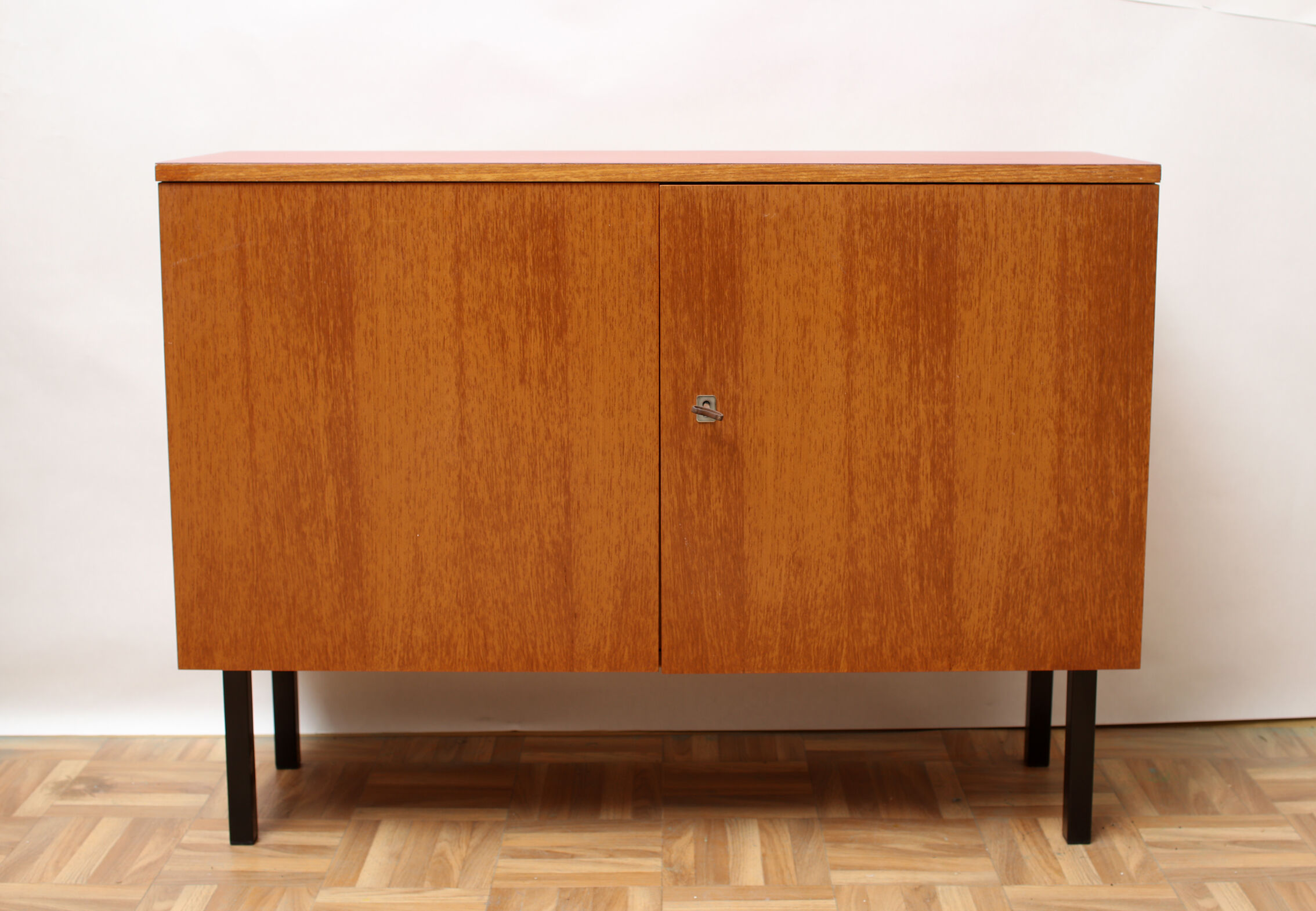 1960s sideboard in teak and formica red