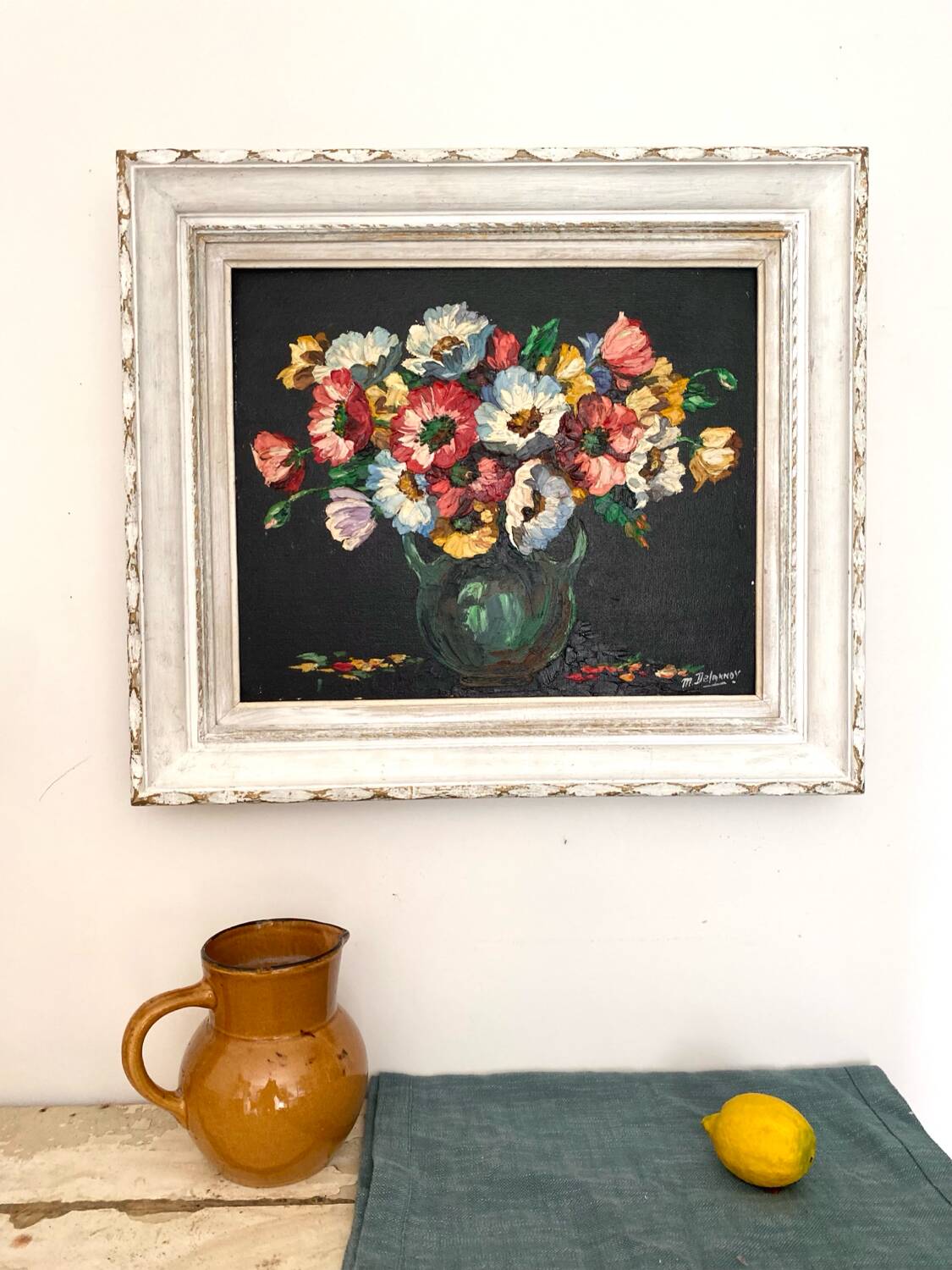 Old oil on canvas depicting a bouquet of flowers