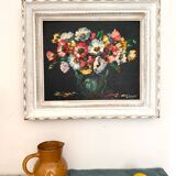 Old oil on canvas depicting a bouquet of flowers