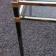 Golden and iridescent metal desk with a glass top from the 70s/80s.