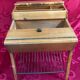 Small sewing table in vintage light cherry