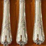 Christofle France, 12 dessert knives and 12 dessert forks in new condition.