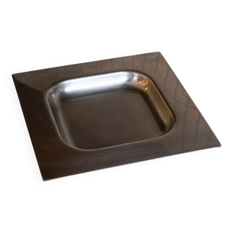 Minimalist stainless steel pocket emptier