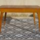 Extendable table, compass legs