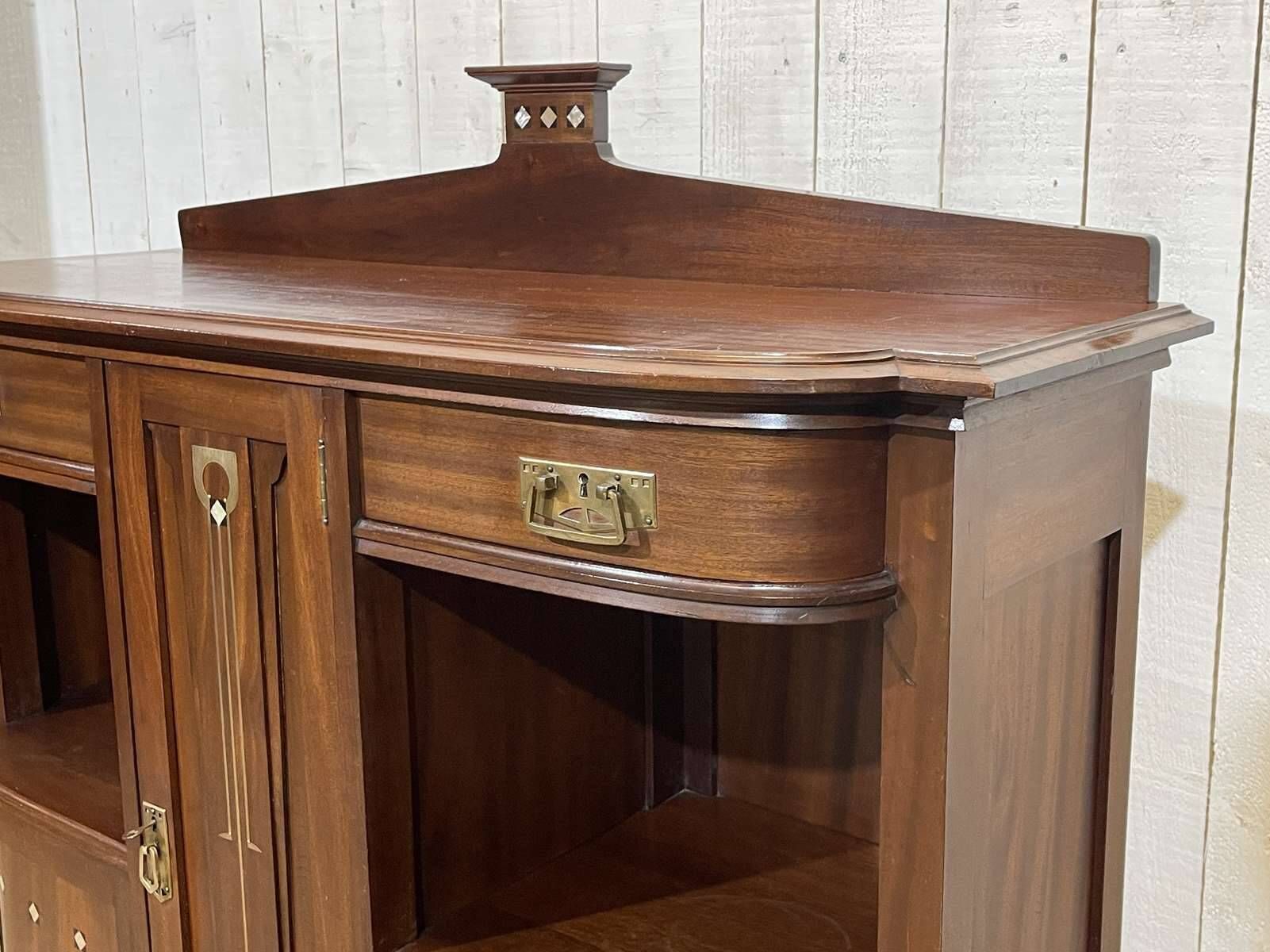 Mahogany sideboard from the Art Nouveau period in the style of Gustave Serrurier-Bovy.