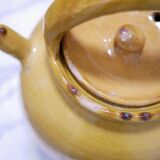 Old gargoulette pot in glazed terracotta