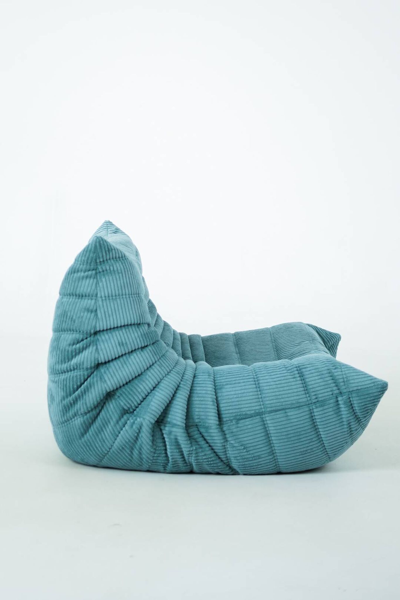 Togo set of armchair and pouf in light blue corduroy