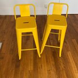 Pair of yellow Tolix high chairs