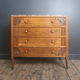 Art Deco commode with marble top, vintage antique furniture.