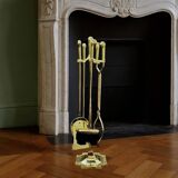 Antique fireplace tool in gilded zamak with duck head designs.