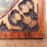 Old oil on wooden panel, carved contours