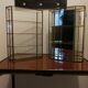 Duo of brass and glass showcases