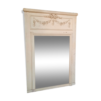 Mirror of woodwork painted white