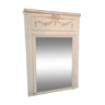 Mirror of woodwork painted white