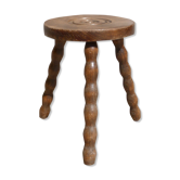 Tripod stool in turned wood