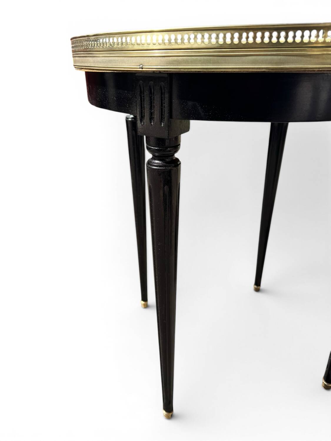 Bouillotte table in Louis XVI style made of blackened wood, marble, and brass.