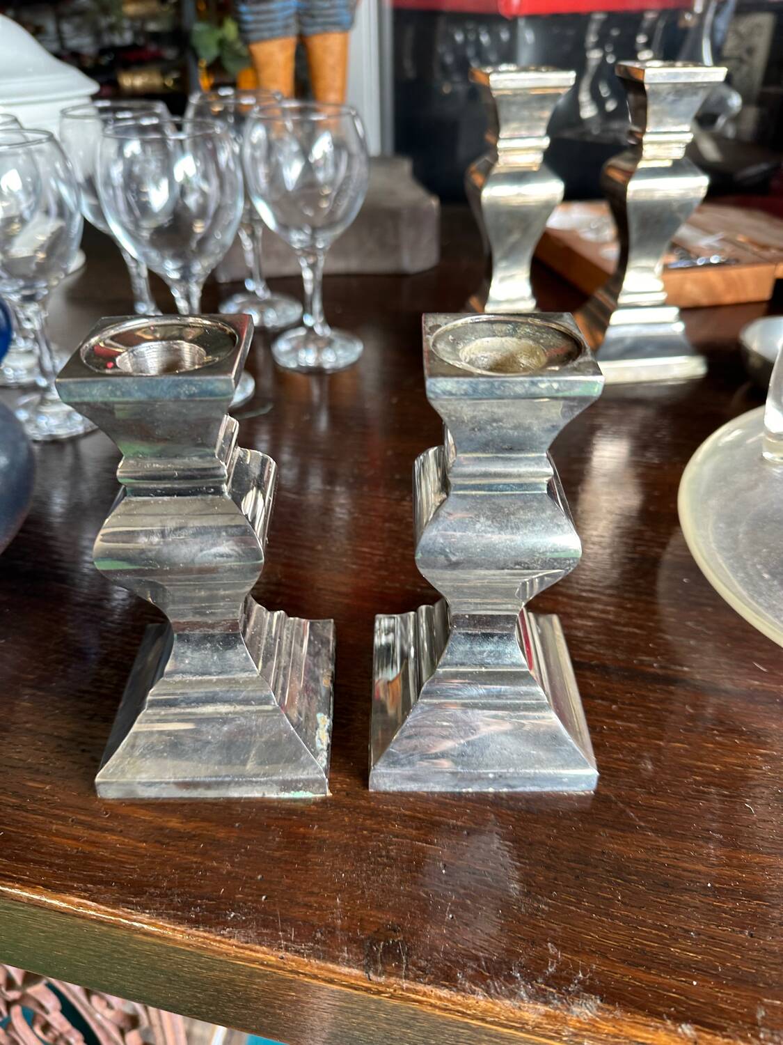 Pair of silver-plated metal candlesticks