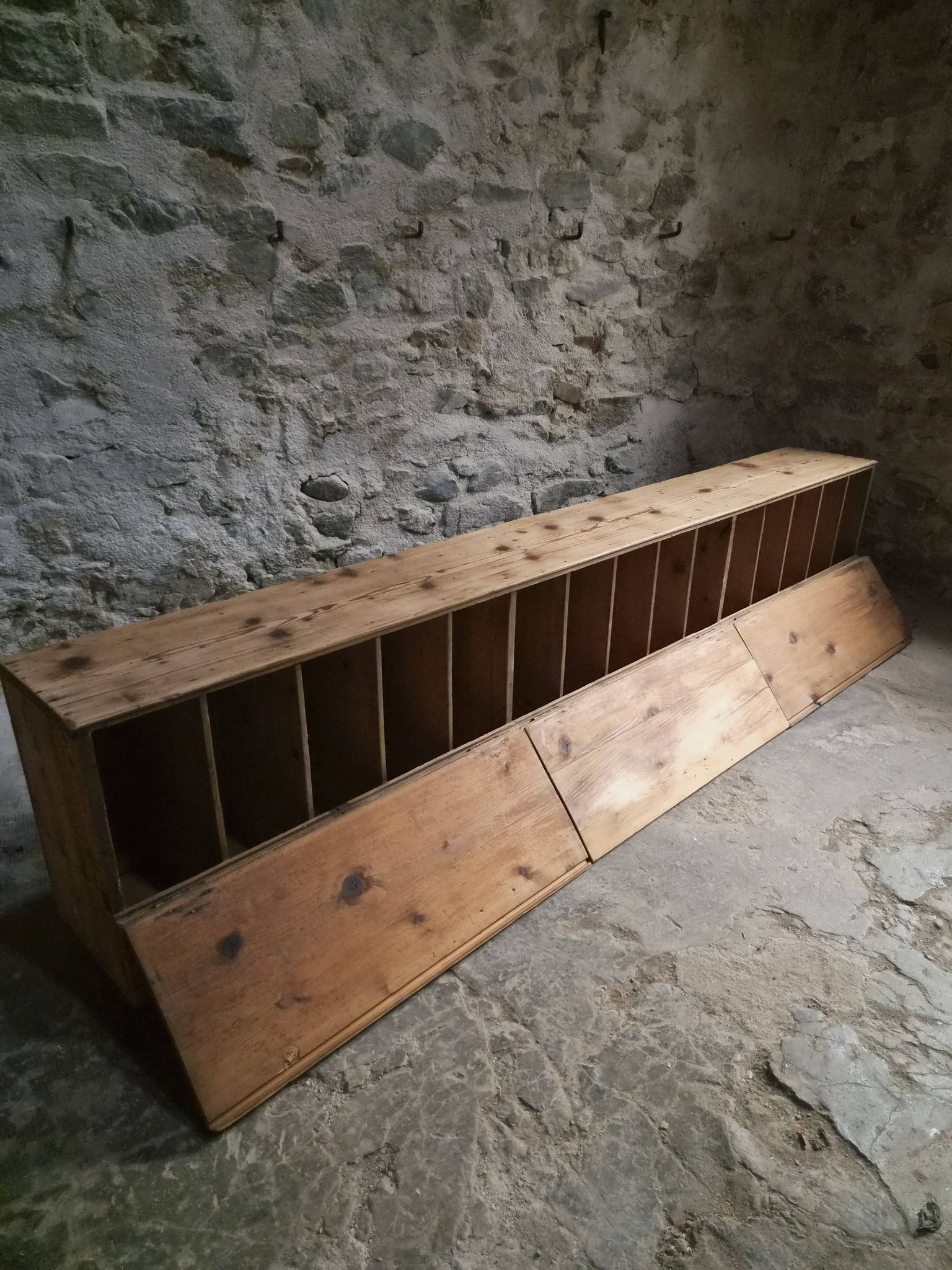 Old French industrial workshop furniture in pine / storage bench, circa 1880–1900