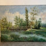Landscape with a bridge signed in 1897