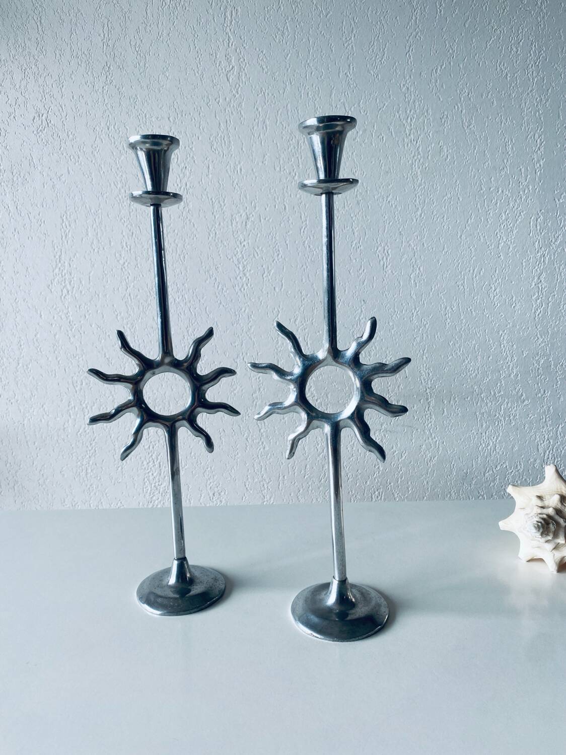 Pair of sun candle holders
