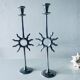 Pair of sun candle holders