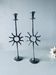 Pair of sun candle holders