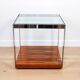 A vintage mid-century glass and rosewood side table by Merrow Associates