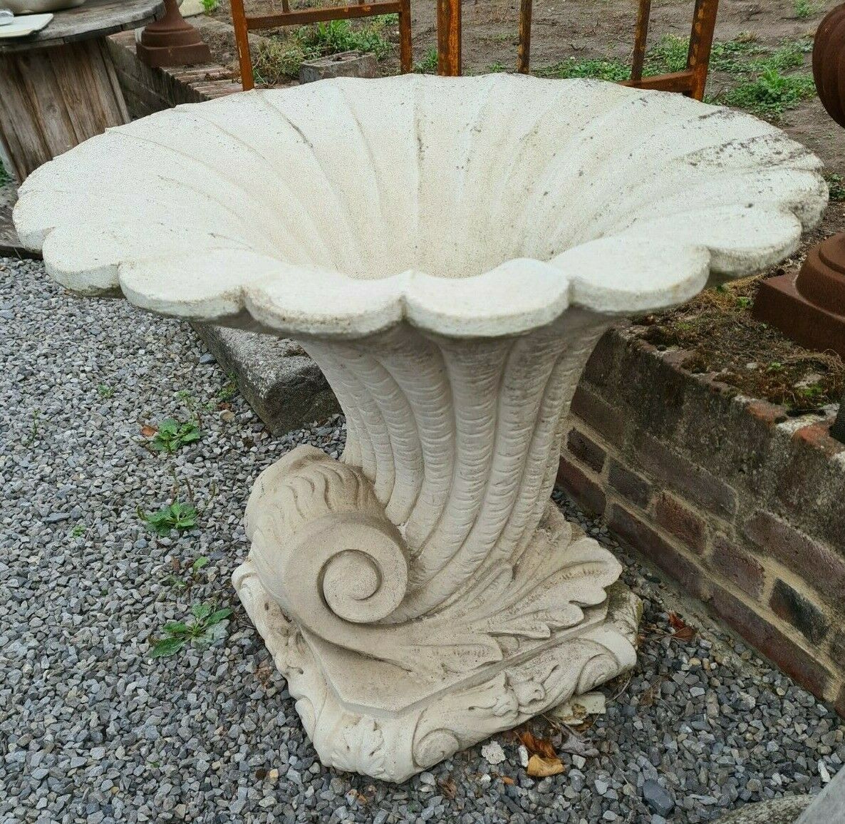 Stone medici in the shape of a cornucopia