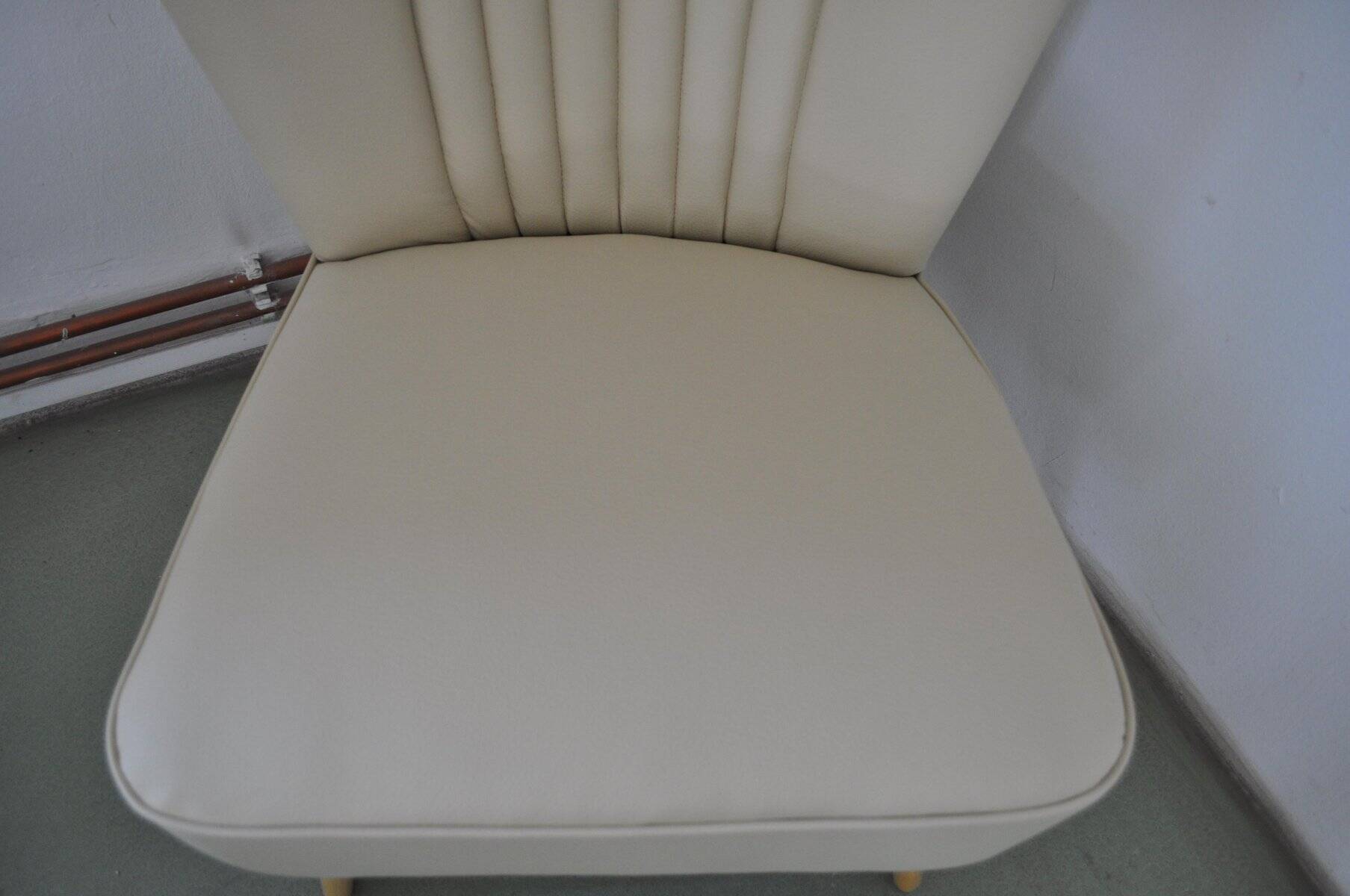 Vintage beige and cream cocktail armchair in fabric and eco-leather on a wooden frame — 1960s.