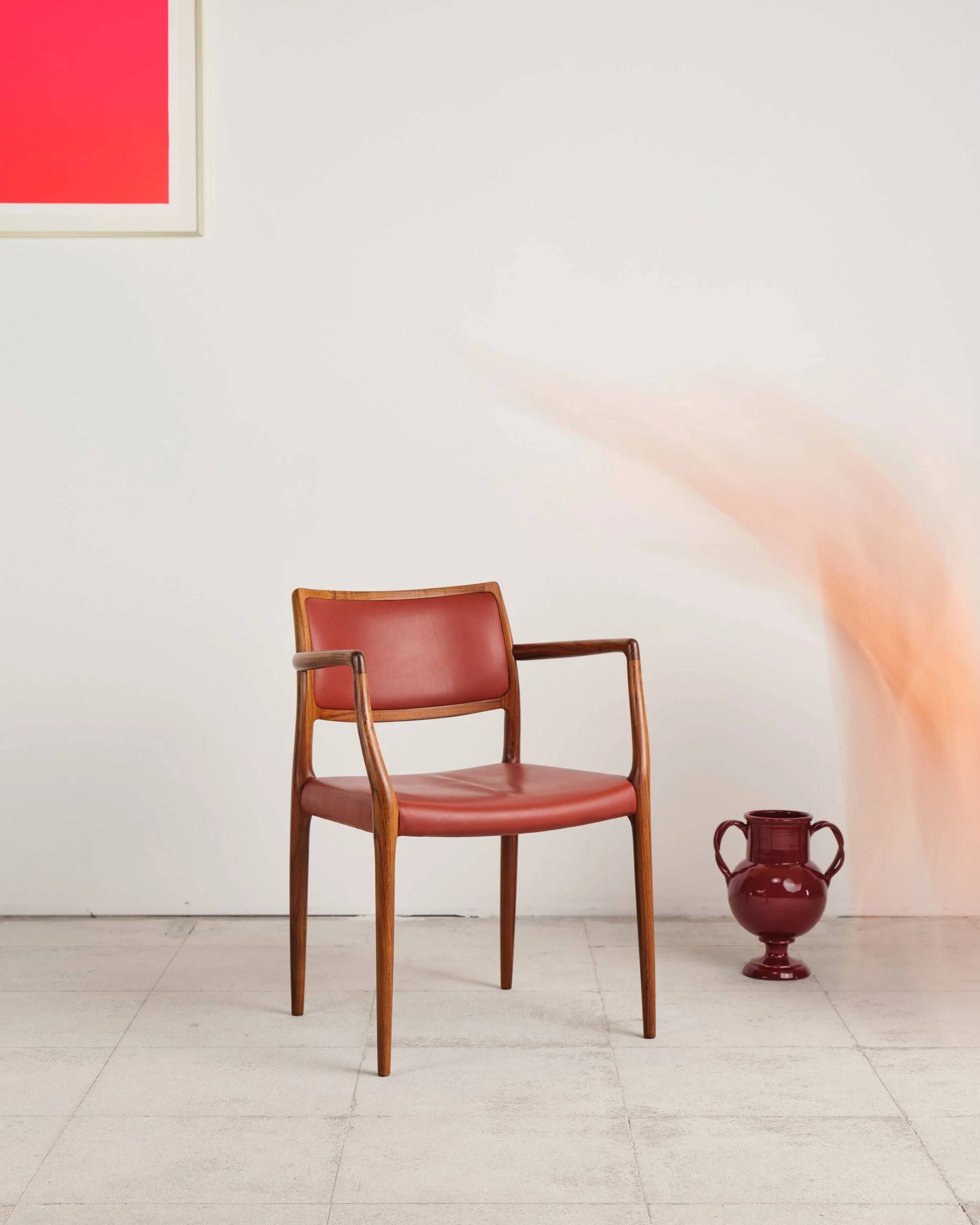 Armchair model 65 in oak and leather by Niels O. Møller, Denmark, 1960s.