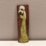 Slim relief with a motif of Madonna and child.