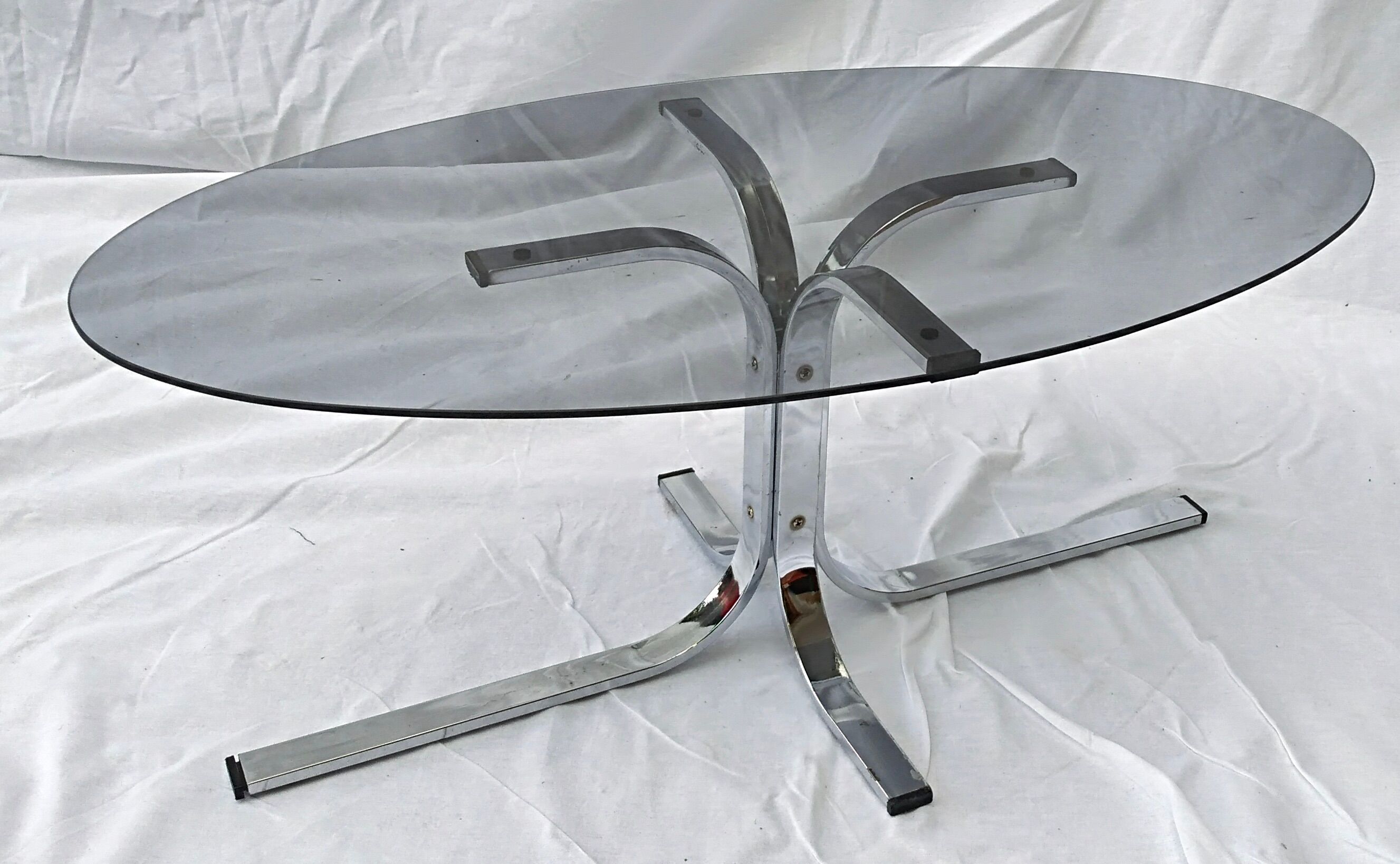 Oval glass coffee table smoked glass chromed metal
