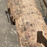 Old carpenter's workbench with press