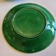 8 green barbotine plates from the early 20th century.