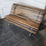 Old cast iron garden bench with oak slats