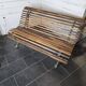 Old cast iron garden bench with oak slats