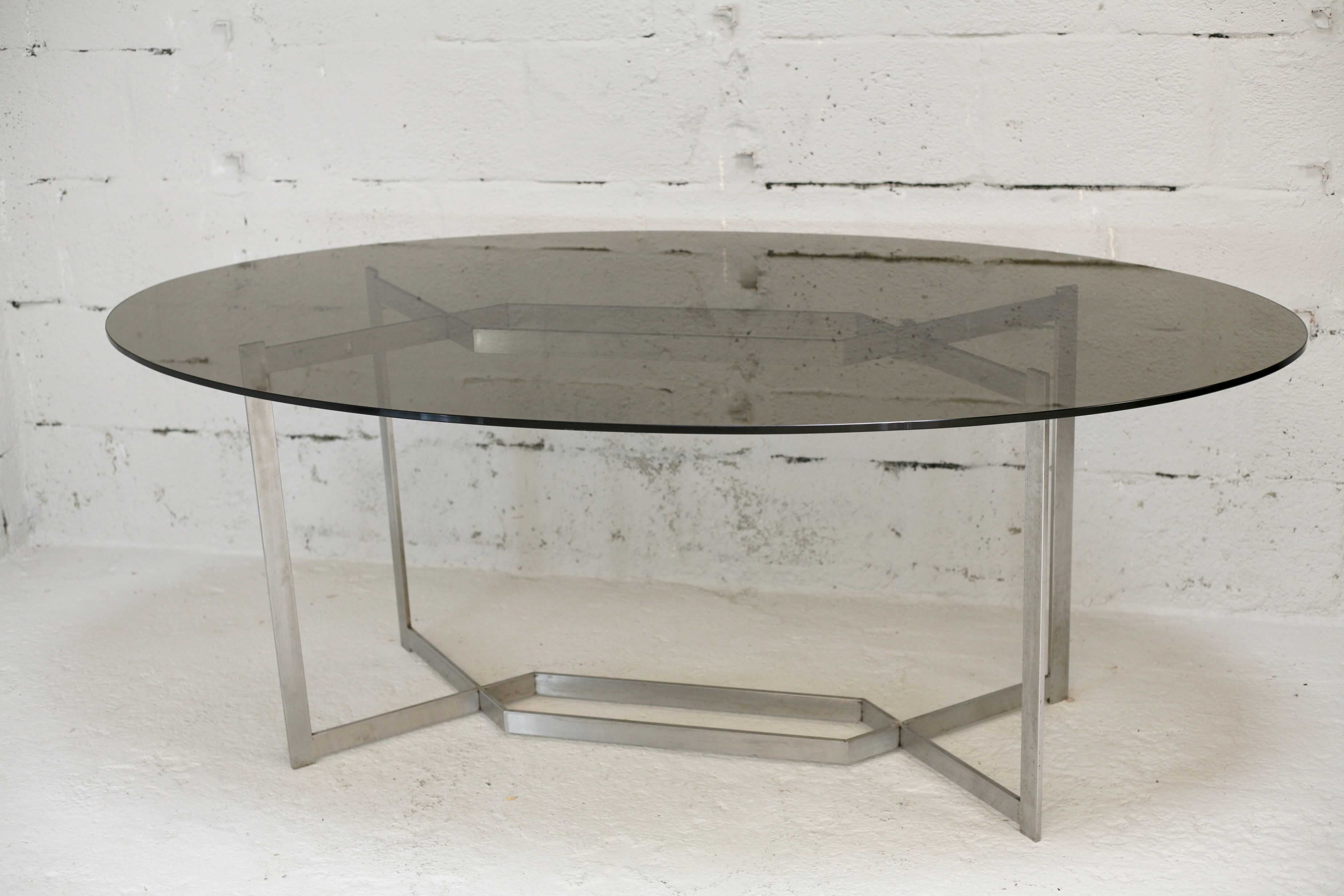 Table de Paul Legard, édition DOM, aluminium brossé et dalle elliptique de verre fumé, France, circa