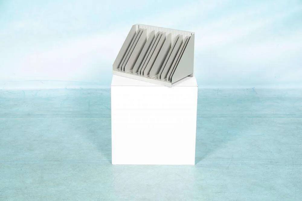 Vintage 1960s metal magazine rack, storage for single LPs.